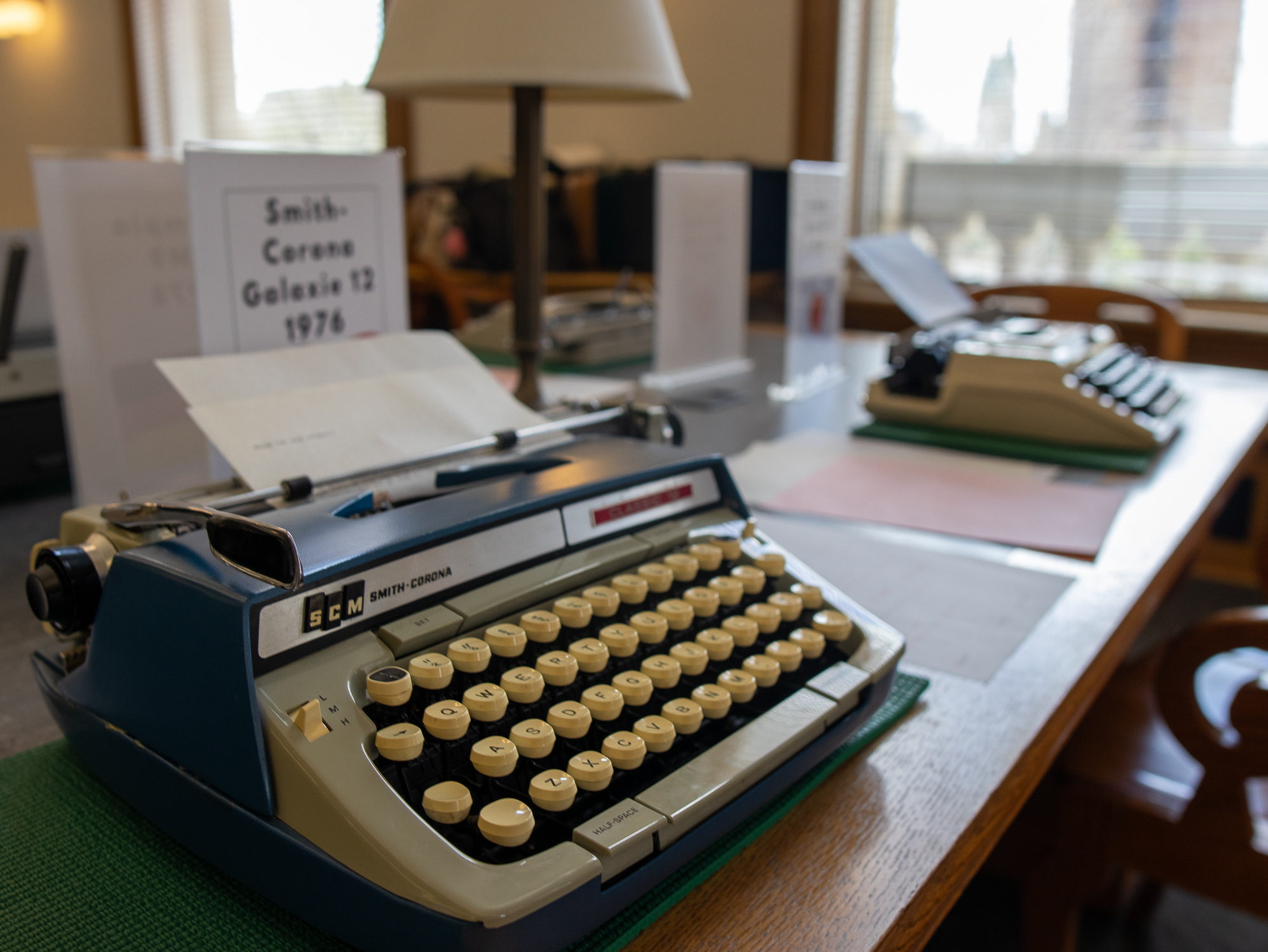 A 1976 Smith-Corona Galaxie 12 typewriter on a table at Milwaukee Zine Fest